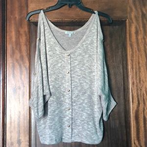 Cold shoulder sweater with studs